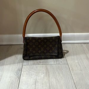 Authentic Louis Vuitton Looping Monogram Bag.